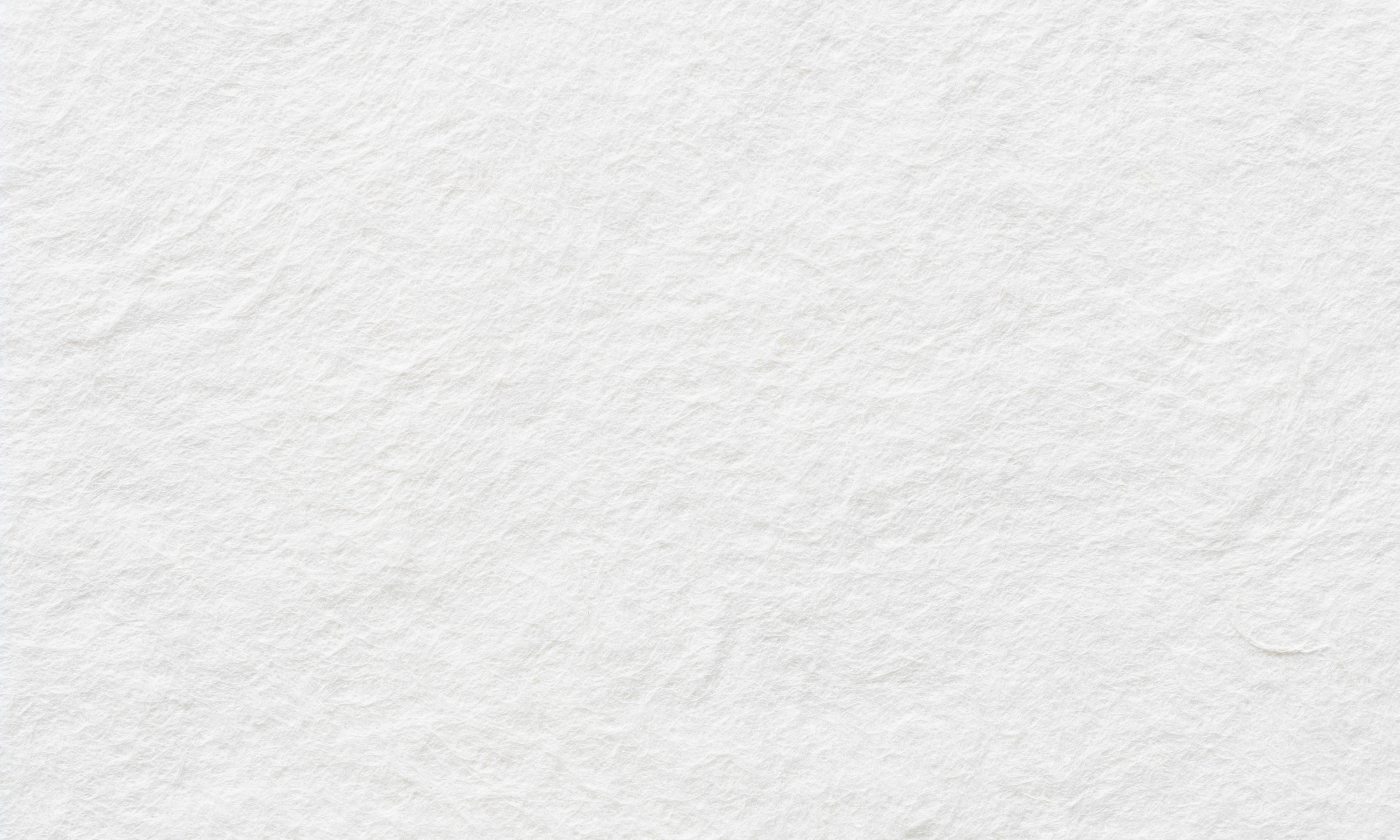 a white background with crushed surface